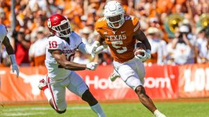 West Virginia looks to control Texas' five-tool running back Bijan Robinson